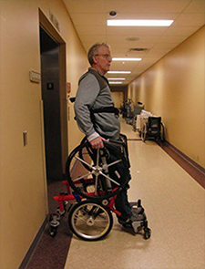 A manual standing wheelchair that is also mobile was developed by researchers at the Minneapolis VA Health Care. (Photo by Billie Slater)