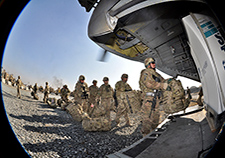 U.S. soldiers from the Guam Army National Guard prepare to board a CH-47 Chinook from Camp Phoenix in Kabul, Afghanistan, in 2013, before heading home. 