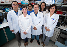 Dr. Didier Merlin (front row, center) and colleagues with VA and the Institute for Biomedical Sciences at Georgia State University are exploring the use of edible ginger-derived nanoparticles to treat inflammatory bowel disease.
