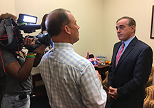VA Secretary Dr. David Shulkin talks with a Fox News reporter at VA Innovation and Demo Day.   