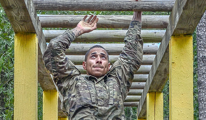 Army Staff Sgt. Miguel Matias, with the 82nd Airborne Division, navigates an obstacle at Fort Bragg in July 2018. A new effort will merge VA data into the military-funded Millennium Cohort Study, for a more complete picture of service members' and Veterans' health outcomes over time. (Army photo by Spc. John Lytle)  