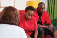 an African-American couple in a therapy session