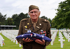 Marion Charles Gray served as an Army medic in World War II and took part in the Normandy invasion. He visited the site in 2009, as part of events honoring the 65<sup>th</sup> D-Day anniversary. Gray passed away this summer. 