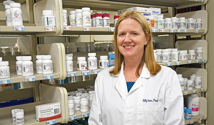 Kelly Davis, a pharmacist at the Lexington VA Medical Center in Kentucky, is part of a team working to reduce inappropriate use of proton pump inhibitors. (Photo by Candace Woods) 