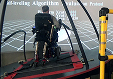 Testing of the MEBot involves a large mechanical platform that tilts and lurches in various directions. <em>(Photo courtesy of HERL)</em> 