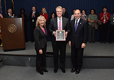 Dr. Terence Keane (center) received the Barnwell Award on Jan. 15, 2016, from VA Secretary Bob McDonald and Dr. Terri Gleason, acting director of the VA Clinical Science Research and Development Service. 