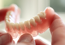 Denture use is associated with a nagging infection called stomatitis, or thrush. VA researchers are working on a new type of denture that fights the problem. (Photo: ©iStock/thelinke)