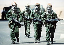 Troops from the 82nd Airborne Division wear protective gear as they try to acclimate to the heat of the Saudi summer during Operation Desert Shield. <em>(Photo by Staff Sgt. F. Lee Corkran/USAF)</em>