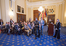
Army Veteran Luke Sprotte, who was paralyzed in a training accident at Fort Bragg after serving two tours in Iraq, demonstrated the ReWalk exoskeleton at a VA research event on Capitol Hill in May. 