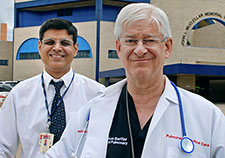    Drs. Manish Joshi (left) and Thaddeus Bartter, physicians with VA in Little Rock, reviewed the latest literature on the health effects of marijuana. (Photo
    by Jeff Bowen)