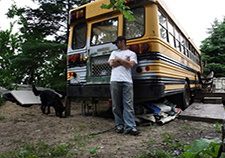 Nick, a former Army National Guardsman, was living in an abandoned school bus when this photo was taken. (Photo by Stormi Greener/ Greater Minnesota
    Housing Fund)