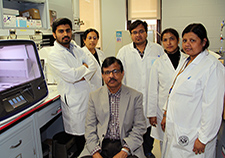 Dr. Sushanta Banerjee (seated) is seen with his research team (from left): Samdipto Sarkar, Dr. Snigdha Banerjee, Dr. Amlan Das, Archana De, and Dr. Gargi Maity. 