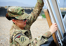  A female soldier loads a marker board into a vehicle during an inventory at a U.S. base in Afghanistan in 2013. A new study found that only a third of women who experienced a sexual assault while in the military sought post-assault health care. 