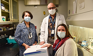 A shipment of serum specimens—the first specimens to be added to the SHIELD biobank—is received in March 2021 by a team at the Cincinnati VA that is part of the biobank network.