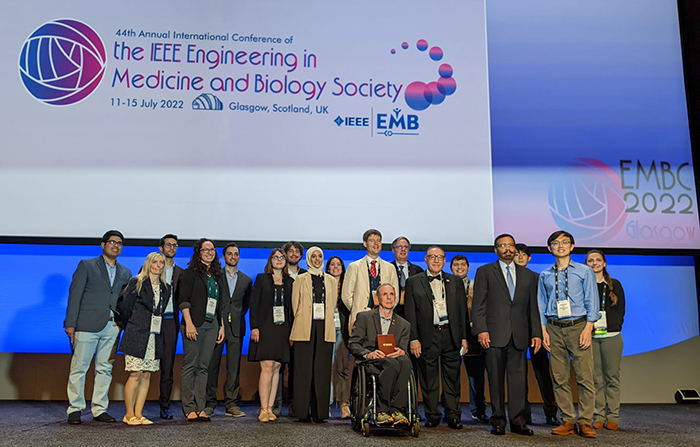 Dr. Rory Cooper and colleagues at the 2022 IEEE Engineering in Medicine and Biology Society conference in Glasgow, Scotland.