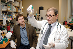 Cleveland VA researcher Dr. Robert Bonomo (right) and colleague Dr. Mark Adams, now with the J. Craig Venter Institute, have been studying the genetic make-up of <em>A. baumannii</em>, a species of bacteria that is resistant to most antibiotics.) 