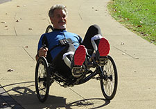  Michael McClellan, a member of Team Cleveland, rides a tricycle used in the Functional Electrical Stimulation Bike Race in the 2016 Cybathlon. (Photo by Nathaniel Welch)