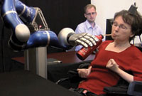 A 58-year-old Massachusetts woman who suffered a paralyzing brainstem stroke 15 years ago while working in her garden was able to serve herself coffee using the BrainGate system and a robotic arm. 