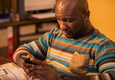 Veterans with chronic back pain who got behavioral therapy via an interactive phone system showed as much relief as those who got in-person therapy. 