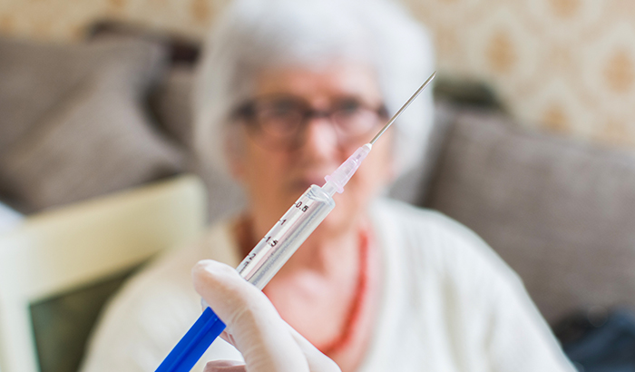 VA researchers studied the effects of standard- versus high-dose flu vaccine on the risk of hospitalization among nursing home residents. 