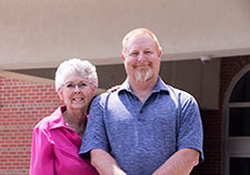 Shawn Christensen, who has been coping with chronic pain triggered by a bad fall he incurred during his Army service, has relied on his mother, Maxine Christensen, for caregiving help in recent years. (Photo by Amil Daniels)  