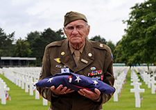 Marion Charles Gray served as an Army medic in World War II and took part in the Normandy invasion. He visited the site in 2009, as part of events honoring the 65<sup>th</sup> D-Day anniversary. Gray passed away this summer.