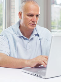 a man using his laptop