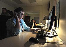 A counselor in action at VA's Center of Excellence for Suicide Prevention, which houses the Veterans Crisis Line and other services. The center will play a role in a VA clinical trial of the drug lithium for suicide prevention.  