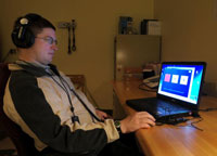 Army Veteran Louis Lamp takes part in computer training that was part of a VA study on treatments for central auditory processing. (Photo by Michael Moody)  