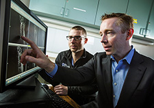 Dr. Harvey Smith (right) is an orthopedic surgeon and researcher with VA and the University of Pennsylvania. (Photo by Tommy Leonardi) 