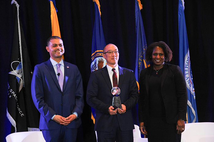 
 Presentation of the 2024 VHA John D. Chase Award for Executive Excellence. (From left to right: Dr. Shereef Elnahal, Under Secretary for Health, Dr. Grant Huang, DCRADO for Enterprise Optimization, and Dr. Erica Scavella, Assistant Under Secretary for Health for Clinical Services.) 