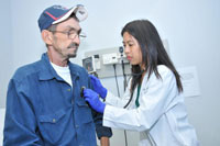 Army Veteran Arlen Anderson, who is living with HIV, is seen by infectious disease fellow Dr. Bich Dang at the Houston VA Medical Center. A VA study on HIV care says the patient-provider relationship is the most critical factor in overall patient satisfaction.