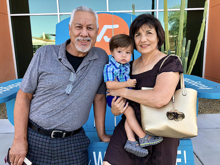 John Gutierrez (left) with his wife, Rosalinda Gutierrez, and their grandson, Quentin Gutierrez, in Phoenix in 2018. 
