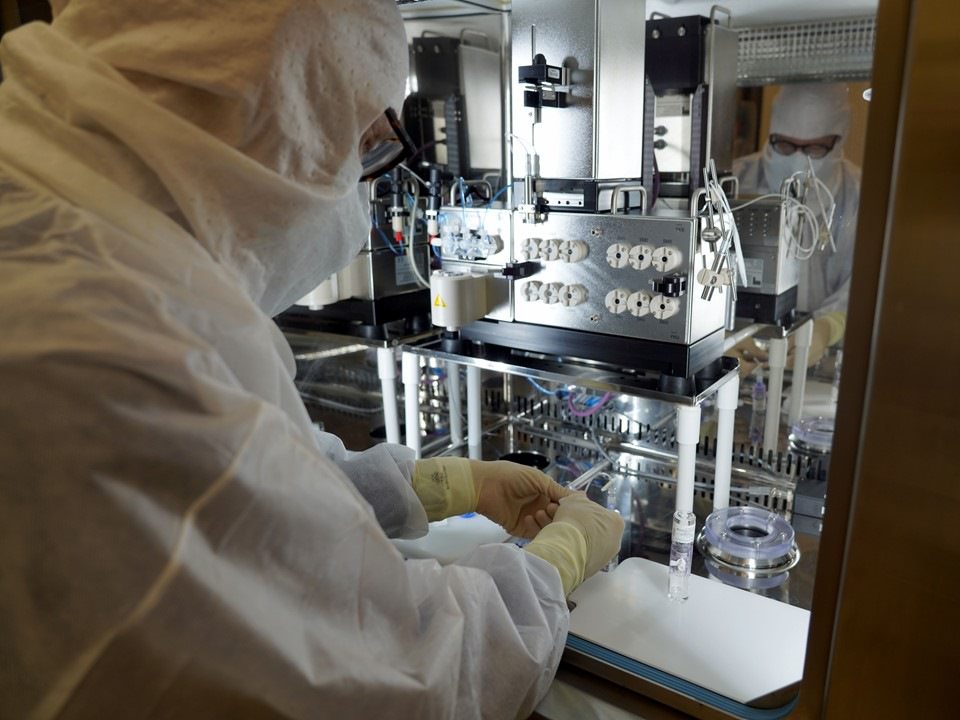 Dr. Timothy Hoffman, a radiopharmaceutical chemist, prepares the tracer drug being used to show whether prostate cancer has spread in the Veterans participating in a clinical trial at the Truman VA. (Photo by Mindy Roettgen)