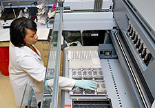 Biomedical technician Weleetka Carter works with DNA samples at the Pharmacogenomics Analysis Lab at the Little Rock VA Medical Center. VA has just funded four new genomic research studies using data from the Million Veteran Program. 