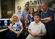 Members of the research team at the Brain Sciences Center at the Minneapolis VA Health Care System, led by Dr. Apostolos Georgopoulos (right). <em>(Photo by April Eilers)</em>  