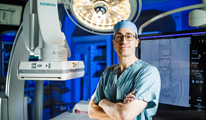 Dr. Scott Damrauer, shown above, with VA and the University of Pennsylvania, together with Dr. Philip Tsao at the VA Palo Alto Healthcare System and Stanford University, led a team investigating the genetic underpinnings of peripheral artery disease. They used data from VA’s Million Veteran Program. (Photo by Tommy Leonardi)  