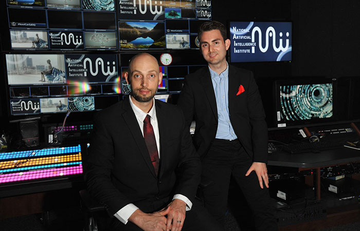 Tim Strebel (left) worked with Dr. Christos Makridis, a senior research advisor at VA’s National Artificial Intelligence Institute, to create the COVID-19 prognostic tool. (Photo by Robert Turtil