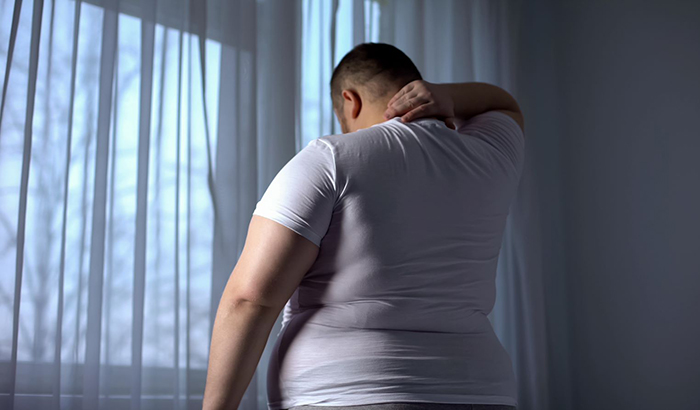 Past research found that of some 46,000 overweight Veterans surveyed, 72% reported painful conditions. (Photo: Â©iStock/Motortion)  