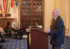 
Dr. Gary Goldish, a specialist in spinal cord injury at the Minneapolis VA Healthcare System, invented a standing manually powered wheelchair.  