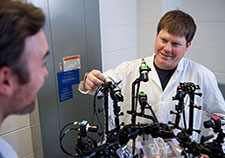 Dr. Levi Sowers is with the Center for the Prevention and Treatment of Visual Loss at the Iowa City VA Health Care System. Some of his research uses optogenetics, which manipulates cells through the use of light. (Photo by Susan McClellen)