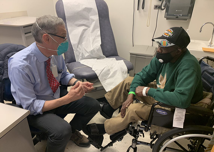 Internal medicine physician Dr. Howard Gordon sees patient Zachary Harris in the Fast Track clinic at the Jesse Brown VA Medical Center in Chicago. (Photo by Chanda Johnson)