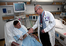 World War II Marine Veteran Stanley Frable, 91, who took part in the COURAGE trial, meets with Dr. Steven Sedlis of VA and NYU Medical Center, whose team just published long-term results from the study. 