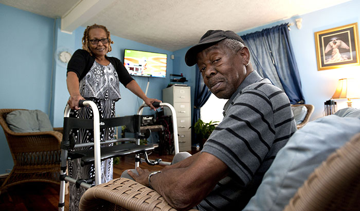 Registered nurse Anita Wilkens has turned her home into a VA medical foster home, in which she provides 24/7 skilled care for James Burgess and two other Veterans. (Photo by Robert Turtil) 