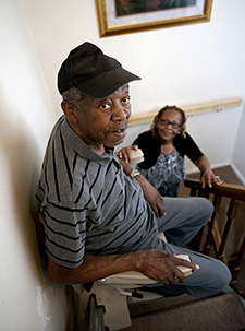 A powered stair climber provided by VA helps Burgess get to his second-floor bedroom. (Photo by Robert Turtil)