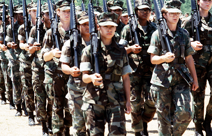 The Marine Corps’ first all-woman drill platoon marches in formation at Quantico in July 1985. Photo for illustrative purposes only. (Photo by SGT. Gruart, via National Archives) 