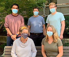 Dr. Kath Bogie's research lab at the VA Advanced Platform Technology Center in Cleveland. Pictured from left to right, standing: Dhruv Seshadri, Bryan Hausman, Jason Collins. Seated: Kath Bogie and Katie Schwartz.