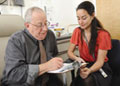 VA's Million Veteran Program recently enrolled its 100,000th Veteran. Here, at an earlier stage of the study, Dr. Pantel Vokonas (left) enrolls in the study at the VA Boston Healthcare System with research assistant Shelley Amberg. Vokonas, a cardiologist for VA, served with the U.S. Navy Medical Corps in Vietnam.