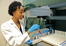 Kia Zellars is a research assistant at a new automated biomarker lab at the Columbia, S.C., VA Medical Center. (Photo by Matt Splett/USCSM) 