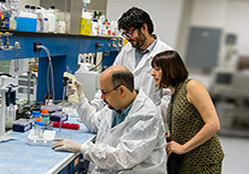  (Clockwise, from right) Drs. Stella Dracheva, Alex Kozlenkov, and Giuseppe Mocci at the Bronx VA Medical Center are studying molecular changes in the brain
    that appear to increase suicide risk. <em>(Photo by Lynne Kantor)</em>